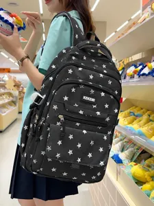 Large capacity black student backpack with white star patterns and multiple pockets