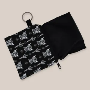 Detail view of the open highland cow print coin purse showing the black interior.