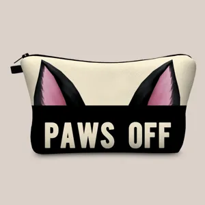 Detailed macro view showing the cute cat ear print and PAWS OFF text on the pouch