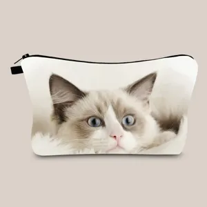 Portable travel cosmetic pouch featuring a cute Ragdoll cat print with secure zipper closure