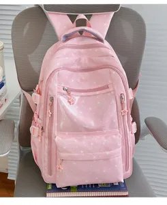 Sac à dos rose mignon avec motifs d'étoiles blanches et fermetures éclair étoiles