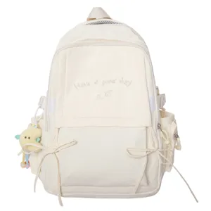 Sac à dos d'écolier blanc crème avec broderie 'Have a good day' et détails de nœuds