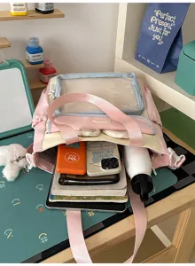 Detailed internal capacity view of pink Japanese style Ita bag for school students