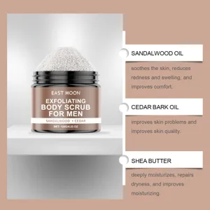 East Moon men body scrub detail view featuring sandalwood and cedar oils with shea butter.