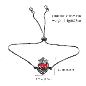 Detailed view of gothic sacred heart red zircon adjustable slider bracelet for women.