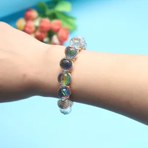 Detail shot of colorful round crystal bead stretch bracelet showcasing multi-faceted design.