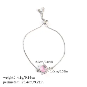 Silver adjustable bracelet featuring a pink heart crystal pendant with delicate thorn details.
