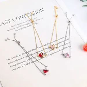 Adjustable slider bracelet set with sparkling red and pink zircon heart charms for women.