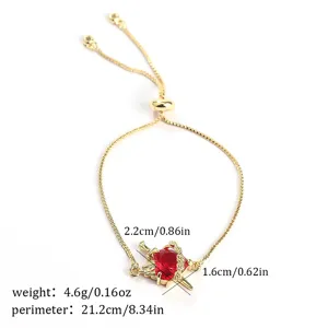 Elegant gold adjustable sliding bracelet featuring vibrant red zircon stone heart pendant.
