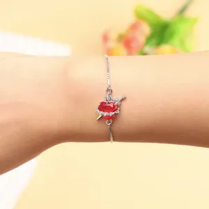 Elegant red zircon heart bracelet with adjustable chain, perfect women fashion jewelry detail.