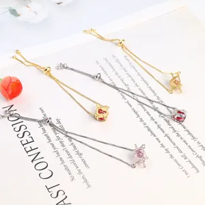 Adjustable red and pink zircon heart crown charm bracelet set in gold and silver chains.
