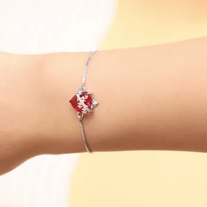 Delicate red cubic zirconia heart bracelet with adjustable silver chain for women detail
