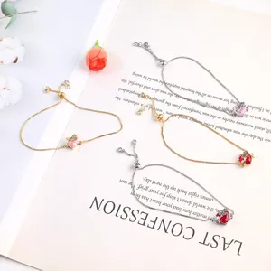 Elegant adjustable bracelet featuring red and pink heart zircon stones with crown charms for women.