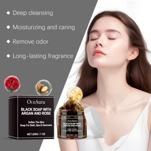 OceAura black soap detail showing argan oil and rose extract formula for deep skin cleaning and care.