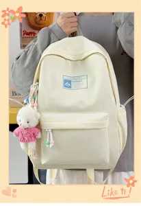 Zaino per studenti color crema minimalista ad alta capacità con ciondolo a forma di orso