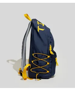 Side view of navy blue student backpack with yellow embroidered letters and cords