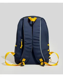 Rear view of navy blue student backpack featuring yellow straps and padded shoulders.