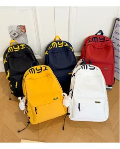 Detailed group view of colorful student backpacks with premium embroidered letters for school