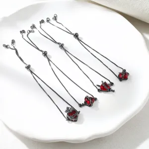 Chic gothic red zircon heart adjustable bracelet with black chain, elegant women's jewelry detail.
