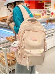 Großer rosa Schulrucksack im koreanischen Stil mit süßem weißem Plüschtier-Anhänger