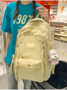 Gelber Schulrucksack mit großer Kapazität und süßem Plüschhund-Anhänger für Mädchen