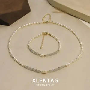 Elegantes Set aus Halskette und Armband mit natürlichen Perlen und grauem Mondstein für Damen.