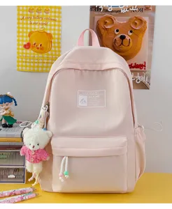 Zaino scolastico rosa pastello in stile coreano per ragazze con un simpatico portachiavi a orsetto
