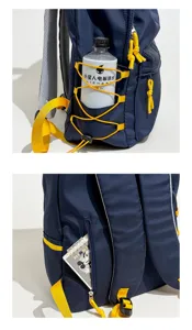 Detail of navy blue backpack showing side water bottle pocket and back zip pocket.