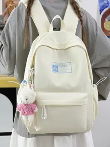 Zaino per studenti in color crema minimalista con un grazioso ciondolo a orsetto