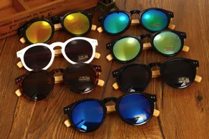 Collection of round sunglasses with handmade bamboo temples in various colorful lenses