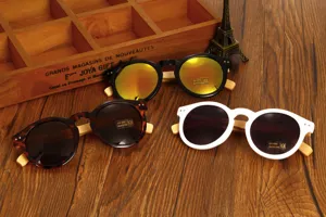 Detail of handmade bamboo temple sunglasses available in three stylish frame colors