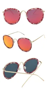 Large round fashion sunglasses with tortoiseshell frames and mirrored red lenses