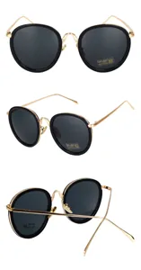 Detailed multi-angle view of round black and gold frame sunglasses with UV400 protection lenses