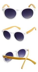 Detailed view of white round sunglasses with natural bamboo temples and UV400 lenses