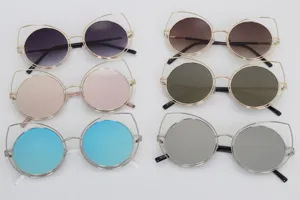 Showcase of six distinct lens colors for cat-eye round sunglasses in gold metal frames.