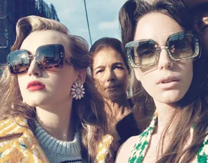 Close-up detail of oversized gradient sunglasses with glitter and tortoise frames