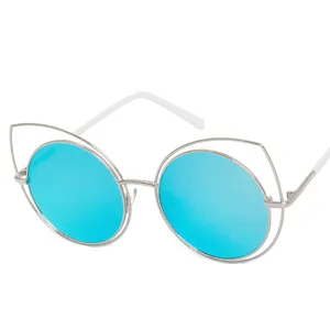 Trendy oversized cat-ear metal frame sunglasses featuring reflective blue round lenses