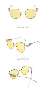 Detailansichten der gelben Flügel-Sonnenbrille mit silbernem Metallrahmen und Flügel-Design
