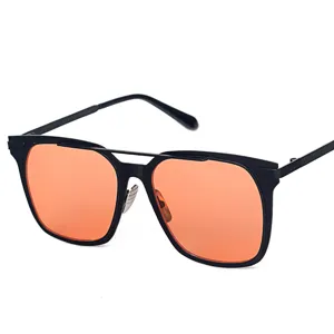Lunettes de soleil élégantes à monture métallique avec verres orange vif