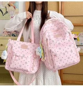 Detail view of pink star-patterned backpack and matching tote bag set for students