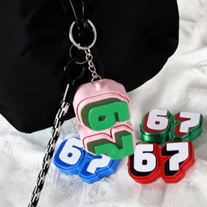 Close-up view of colorful 67 fidget clicker keychains, press toy pendant accessories.