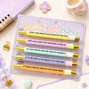 Detailed view of mental health humor ballpoint pen set featuring colorful barrels and card.