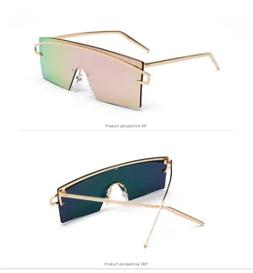 Detail view of oversized shield sunglasses with gold metal frame and mirrored lenses