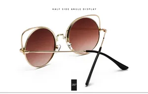 Retro round sunglasses with gold cat ear metal frame and brown gradient lenses
