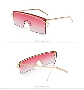 Detailed view of oversized shield sunglasses with pink gradient lenses