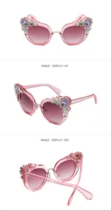 Detailed view of pink rhinestone flower sunglasses from multiple angles