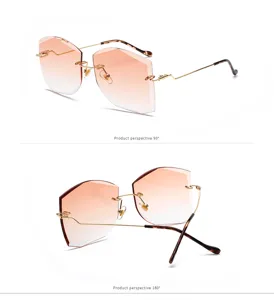 Vistas detalladas de gafas de sol degradadas sin montura con patillas doradas onduladas para mujer