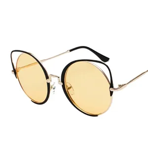 Retro cat-ear round sunglasses with yellow lenses and gold metal frames for women