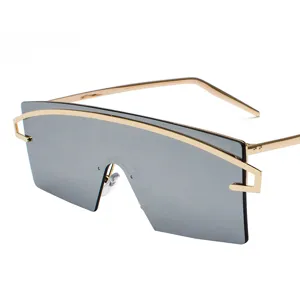 Fashionable one-piece shield sunglasses featuring gold metal frame and silver lens