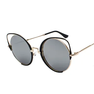 Vintage cat-eye round sunglasses with gold metal frame and grey lenses for women